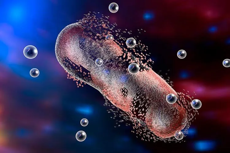 An illustration of silver nanoparticles destroying bacteria
