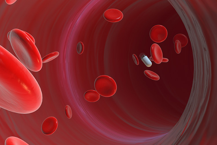 Illustration of red blood cells with a medicine