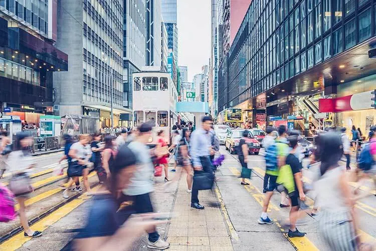 Pedestrians walking in a city.