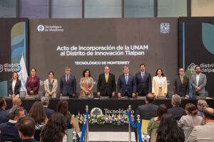 Photograph of a group of people standing at an academic ceremony