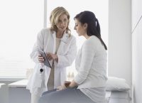 photo of a doctor and a patient