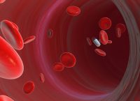 Illustration of red blood cells with a medicine