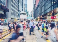 Pedestrians walking in a city.