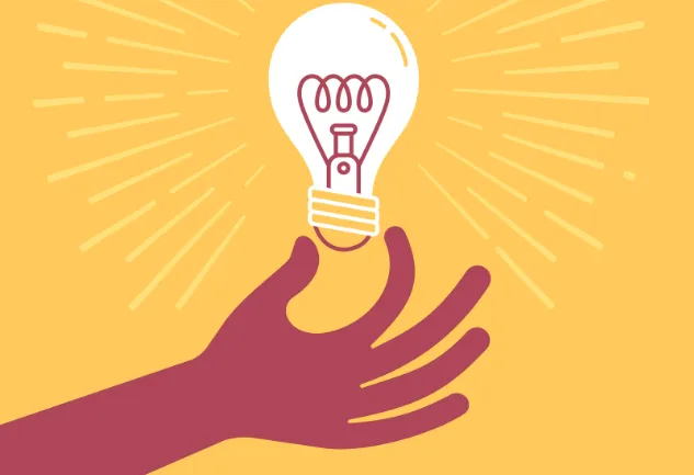 Mano agarrando un foco, representando una idea