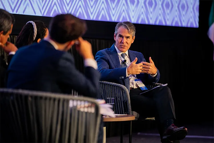 A man speaks in a conference