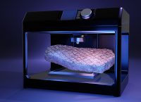 imagen de una impresora 3D con un filete de carne