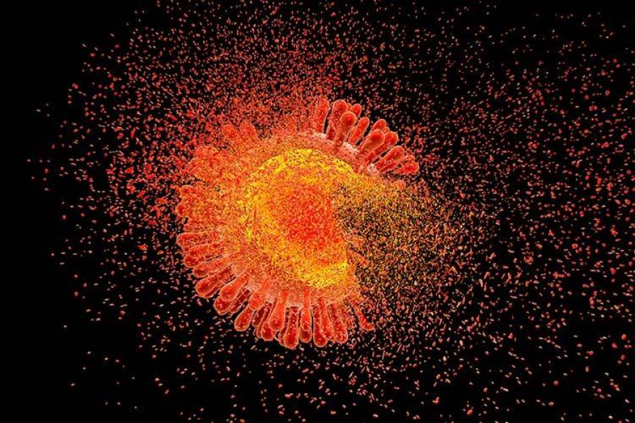 Ilustración 3D de una partícula del virus del VIH, de color naranja y amarillo, que se desintegra en fragmentos sobre un fondo negro.