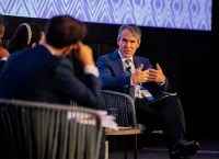 A man speaks in a conference